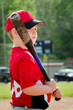 Photo: Portrait of child preparing to bat during baseball game Portrait of child preparing to bat during baseball game