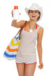 Happy beach young woman showing sun block creme