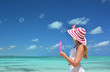 Girl making soap bubbles