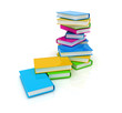 Colorful real books on white background