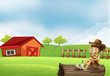 A Boy At The Farm Sitting In T...