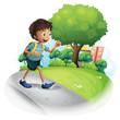A boy with a bag walking along the street