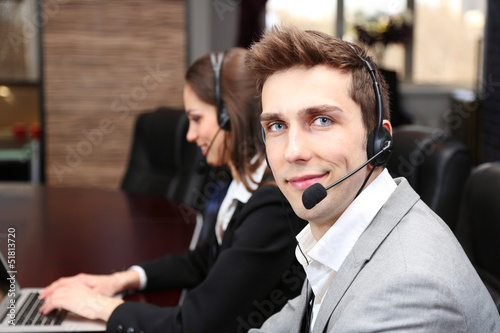 Photo: Call center operators at work. Call center operators at work.