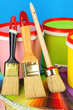 Set for painting: paint pots, brushes, palette of colors