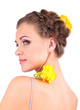 Young woman with beautiful hairstyle and flowers, isolated