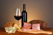 Exquisite still life of wine, cheese and meat products