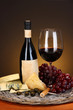 Refined still life of wine, cheese and grapes