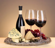 Refined still life of wine, cheese and grapes