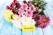 Bouquet of beautiful chrysanthemums on table close-up