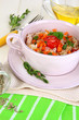 Delicious rice with vegetables and herbs in pot