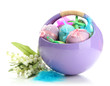 Beautiful easter eggs in basket and lilies of the valley,
