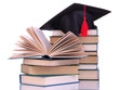Grad hat with books isolated on white