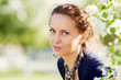Beautiful woman in a spring garden