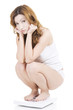 Photo: Sad woman on scale Sad woman on scale
