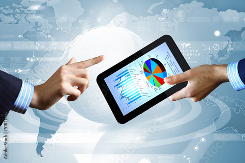 Photo: Modern computer technology in business Modern computer technology in business