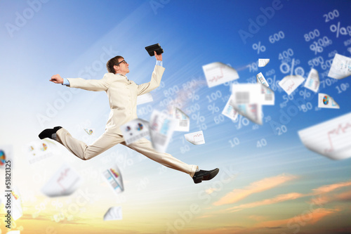 Photo: Image of jumping businessman Image of jumping businessman