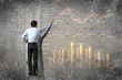 businessman drawing diagram