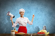 Asian female cook holding megaphone