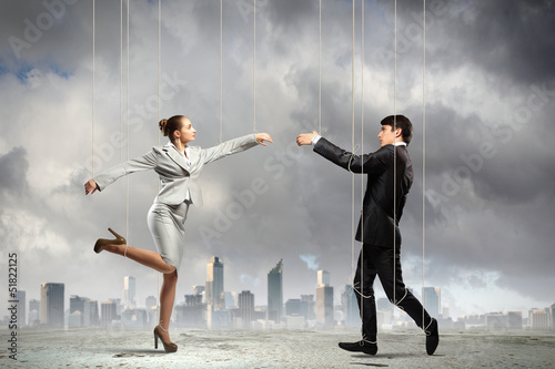 Photo: Puppet businesspeople Puppet businesspeople