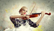 Photo: Gorgeous woman playing on violin Gorgeous woman playing on violin