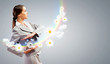Businesswoman holding alarmclock