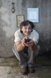 smiling man with remote control