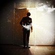Photo: Young businessman opening door Young businessman opening door
