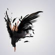 Woman floating   on dark wings