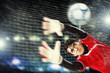 Goalkeeper catches the ball