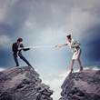 Photo: People pull the rope. People pull the rope.