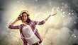 Young girl listens to music