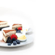 tiramisu dessert with berries and cream