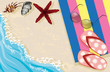 Flip-flops, sunglasses, towel and shells on the beach