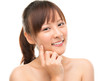 Skin care woman putting face cream