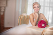 Beautiful bride in wedding dress with bouquet bridal flowers