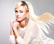 beautiful woman with fashion makeup and long white hairs