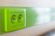 Green appliance receptacle for charging. Close up