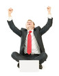 Portrait of a happy young businessman working