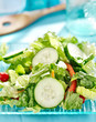 salad with cucumbers close up on glass plate