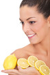 portrait of a beautiful woman with lemon fruit