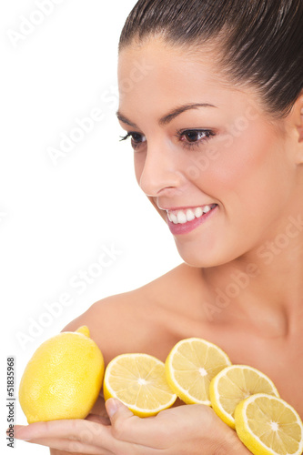 Photo: portrait of a beautiful woman with lemon fruit portrait of a beautiful woman with lemon fruit