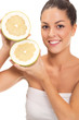 beautiful women holding a big grapefruit