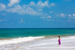 Woman takes rest at the sea shore