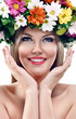 Beautiful woman with flower wreath