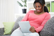 Photo: black woman using digital tablet black woman using digital tablet
