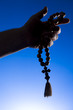 Foto: rosary in hand rosary in hand