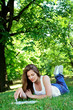 Attractive girl relaxing in park