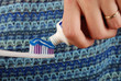 Foto: Woman brushing her teeth Woman brushing her teeth