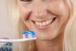 Woman brushing her teeth
