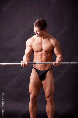Photo: young bodybuilder traininig young bodybuilder traininig